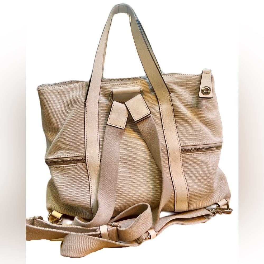 Henri Bendel Jetsetter convertible backpack with purple interior lining. - Picture 8 of 15